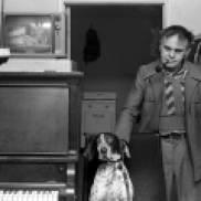 man, dog, piano, television,
